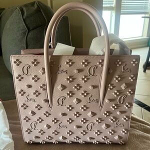 Louboutin medium sized tote bag with strap.